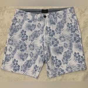 Short for men, brand Jachs New York, size 31, color white with flowers.